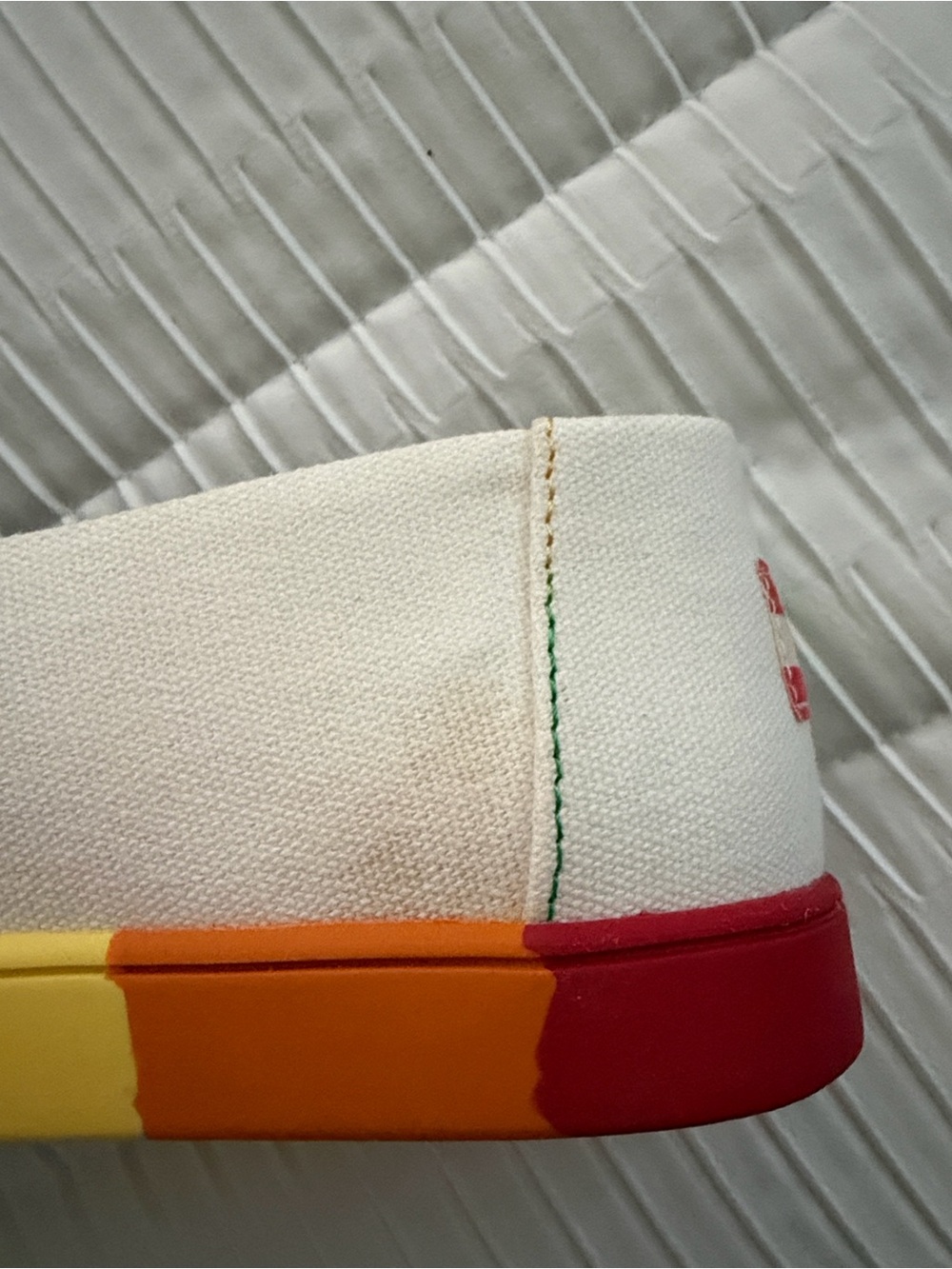 TOMS White Canvas Slip-Ons with Rainbow Pride Insole - Picture 9 of 9